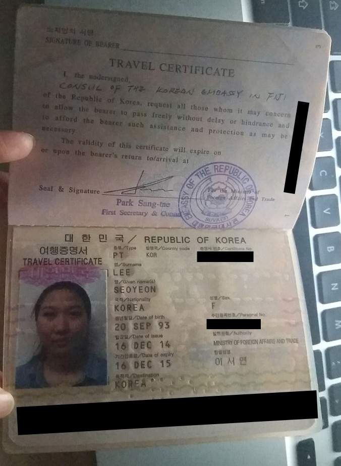 Seo-Yeon Lee’s travel certificate, stamped by the Korean embassy in Fiji, is shown.