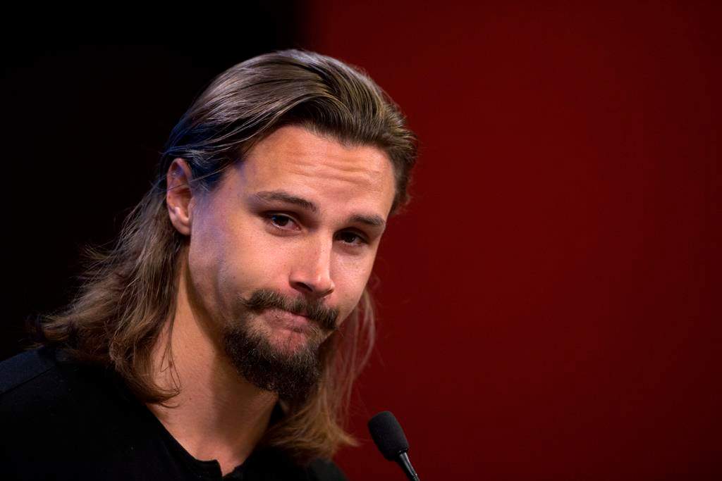 Erik Karlsson talks to media during the Ottawa Senators first day of hockey training camp in Ottawa on Thursday, Sept. 13, 2018.