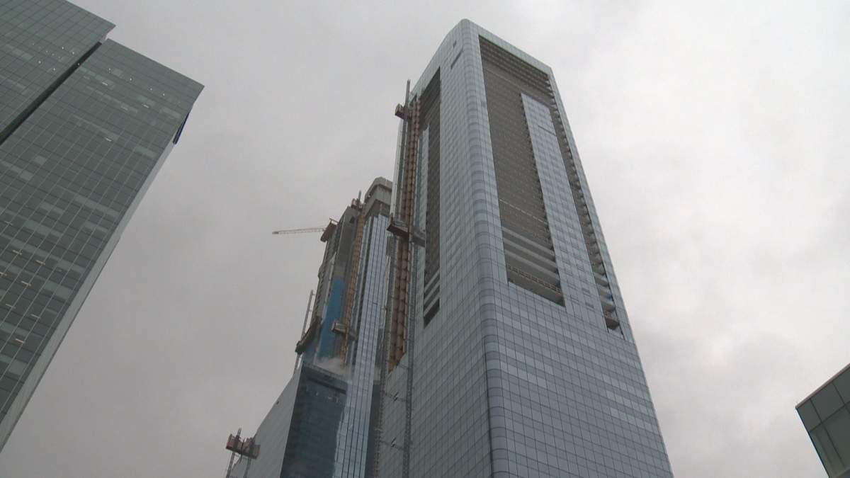 Edmonton’s two tallest skyscrapers tower over other buildings.
