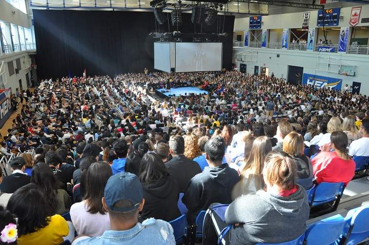 UBC president Santa Ono addresses a packed gymnasium as he welcomes more than 2,400 first-year students to the Okanagan campus in September 2018.