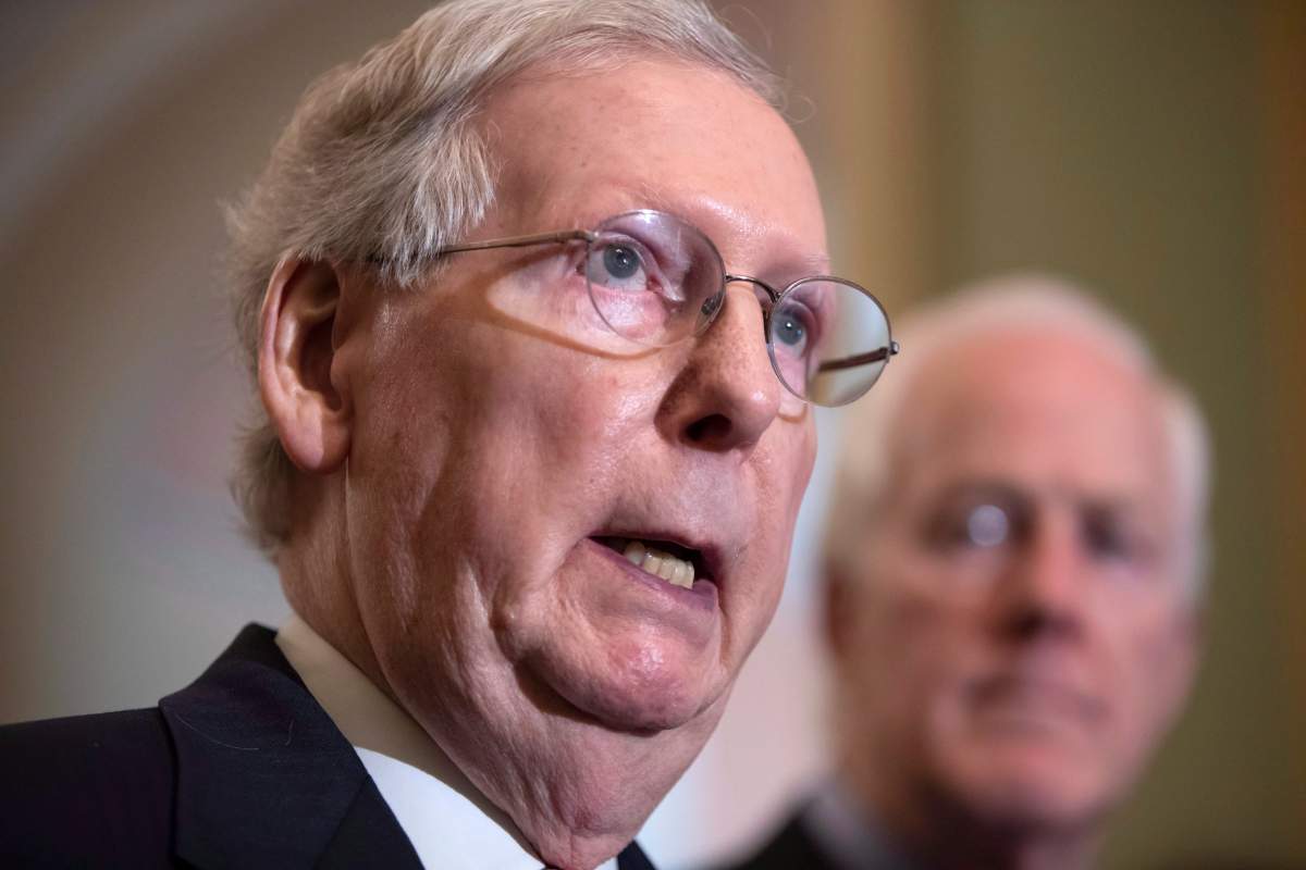 Senate Majority Leader Mitch McConnell, R-Ky., joined at right by Majority Whip John Cornyn, R-Texas, speaks with reporters about Supreme Court nominee Brett Kavanaugh following their weekly policy meetings, at the Capitol in Washington, Tuesday, Sept. 18, 2018.
