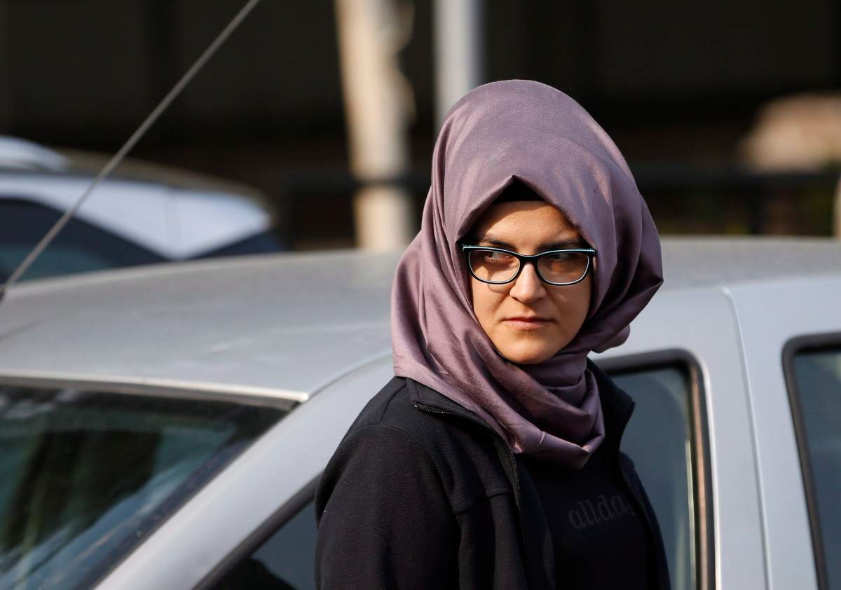 A woman who identified herself as Hatice A., the Turkish fiancee of Saudi journalist Jamal Khashoggi, walks outside the Saudi Arabia consulate in Istanbul, Wednesday, Oct. 3, 2018.