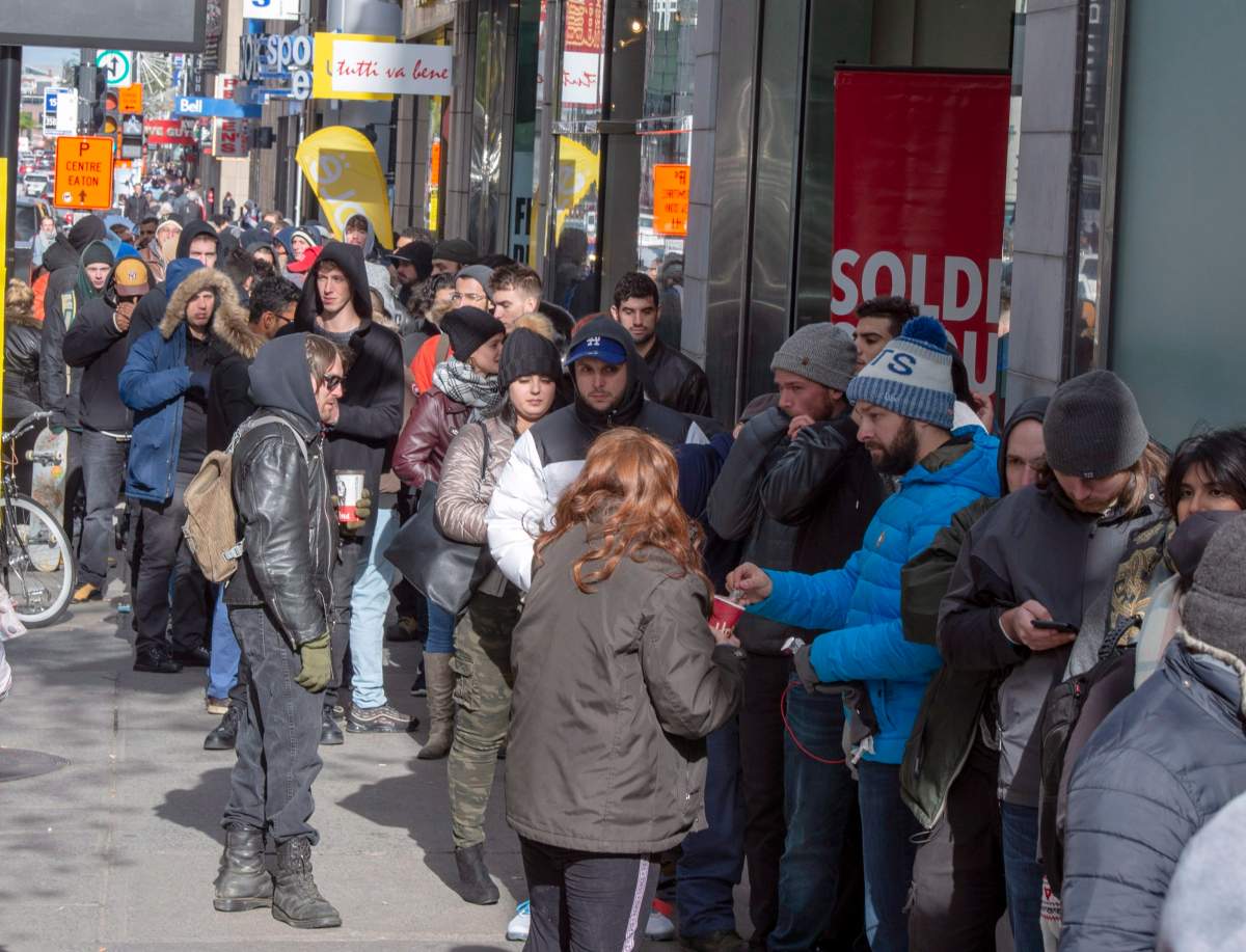 Customers lineup at a government cannabis store Thursday, October 18, 2018 in Montreal on the second day of the legal cannabis sales in Canada. 
