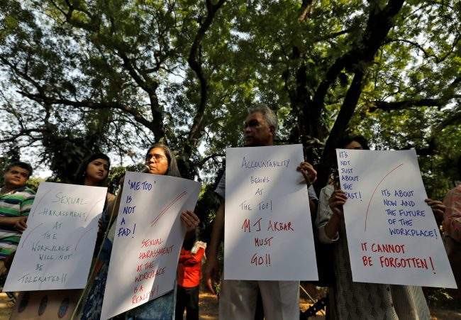 Indian journalists hold placards during a protest against what they say is sexual harassment in the workplace in New Delhi, India, October 13, 2018.