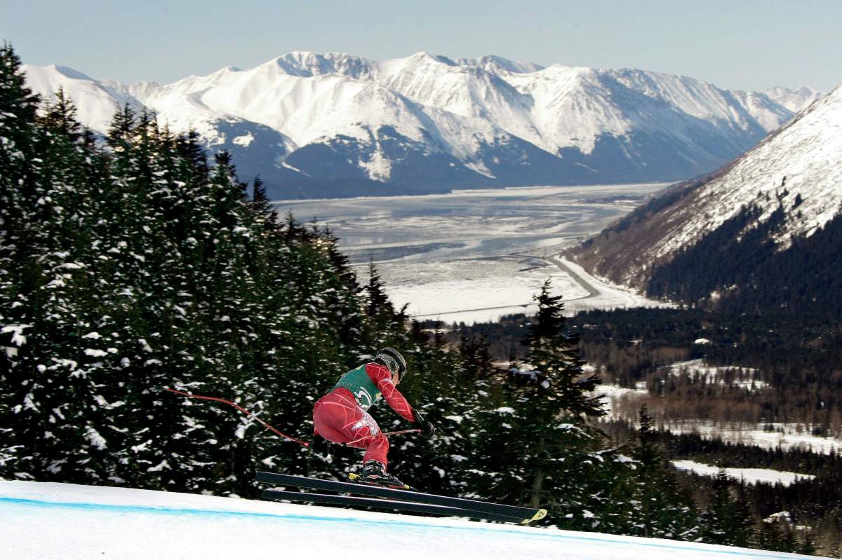 A skier races down the hill at Alyeska Resort in Girdwood, Alaska during the U.S. Alpine Championships in this March 29, 2007 file photo. 