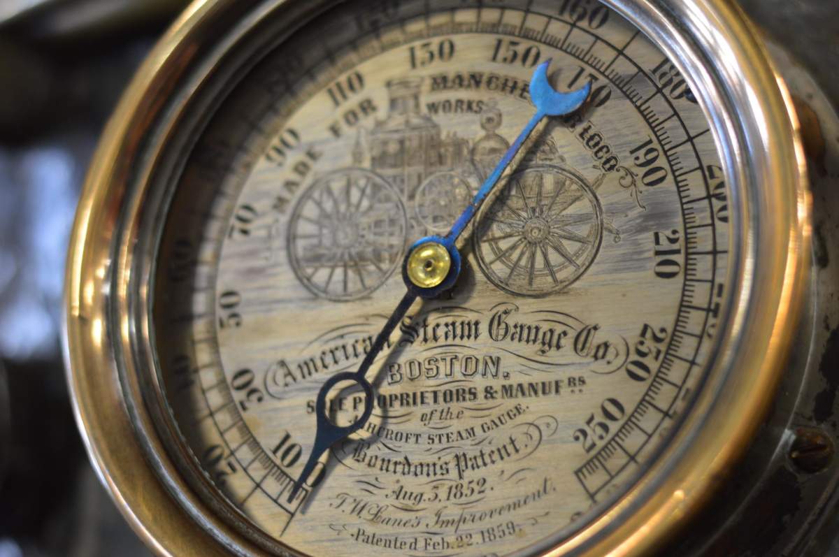 A close-up of one of the pressure gauges aboard the Lulan.