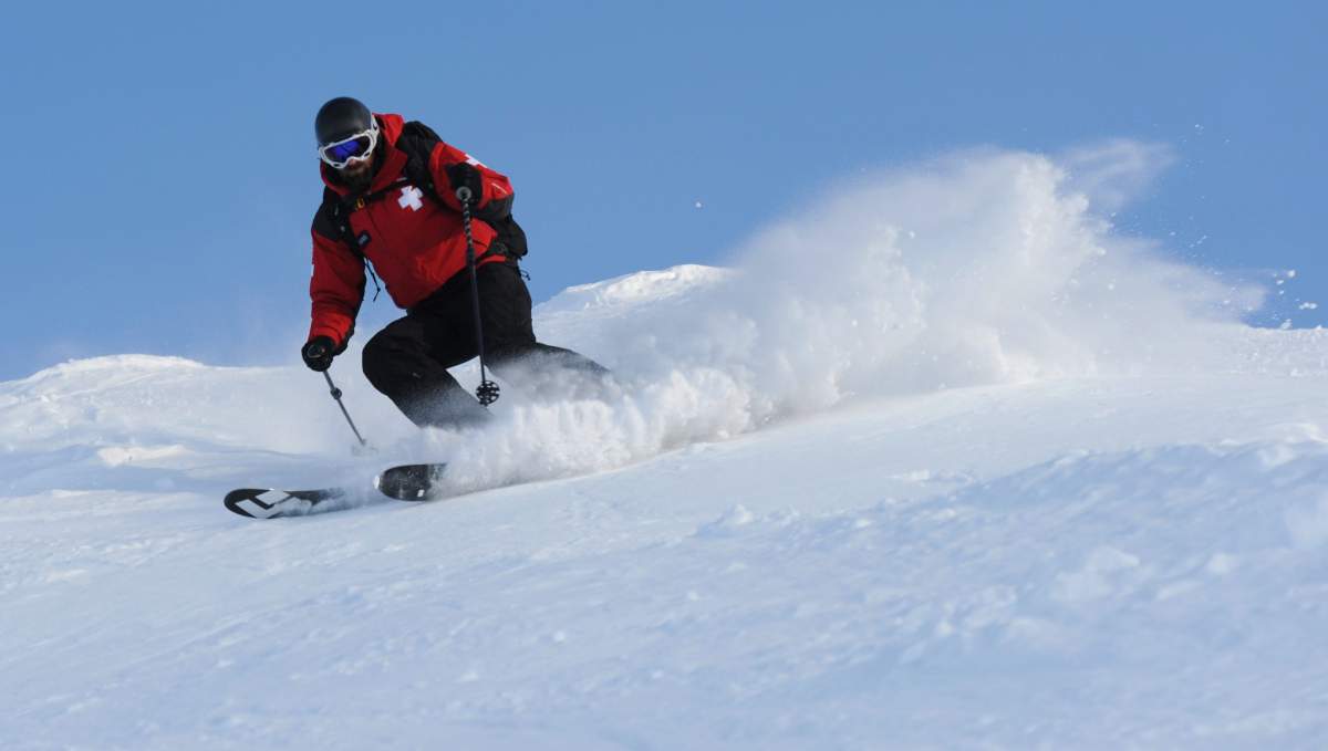 Ski Patrol director Ben Habecker kicks up some snow while skiing at the top of Alyeska Resort on Dec. 2, 2010.