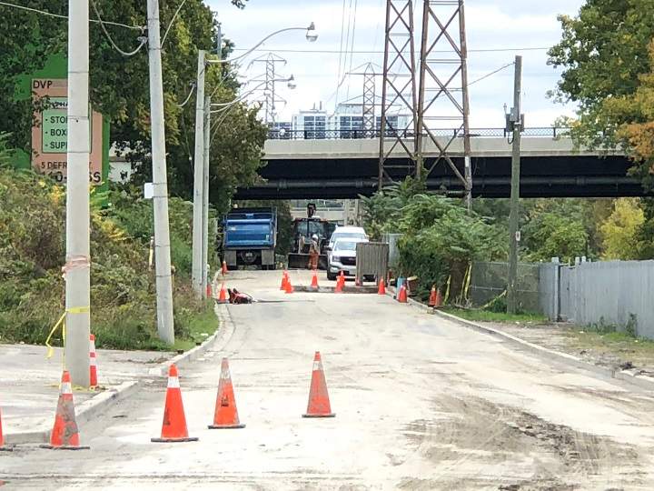 Crews can be seen repairing after a water main break has closed down Bayview Avenue for the weekend.
