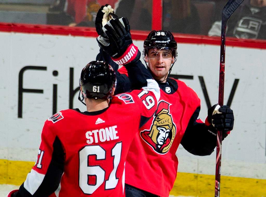 Ottawa Senators centre Colin White (36) celebrates his goal with teammate right wing Mark Stone (61) during second period NHL action against the Los Angeles Kings in Ottawa on Saturday, October 13, 2018.