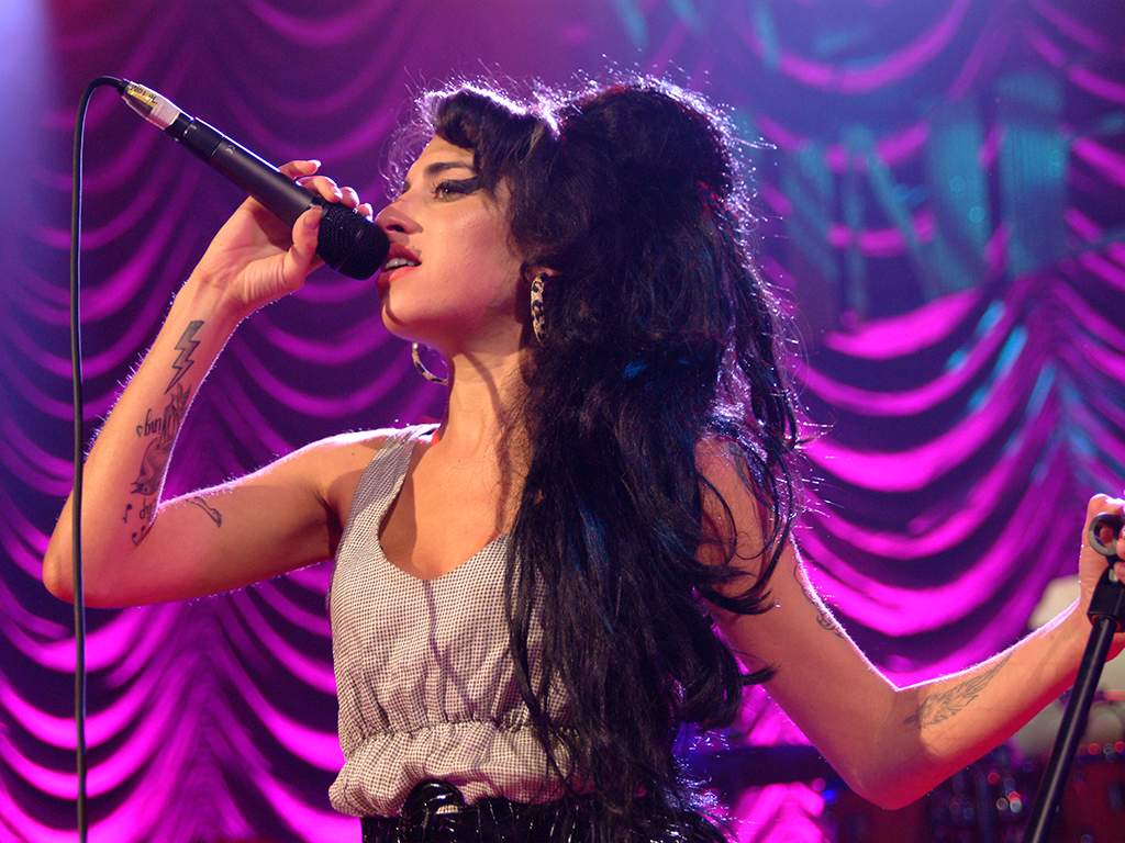 Amy Winehouse, performing at Shepherd's Bush in London, England.  