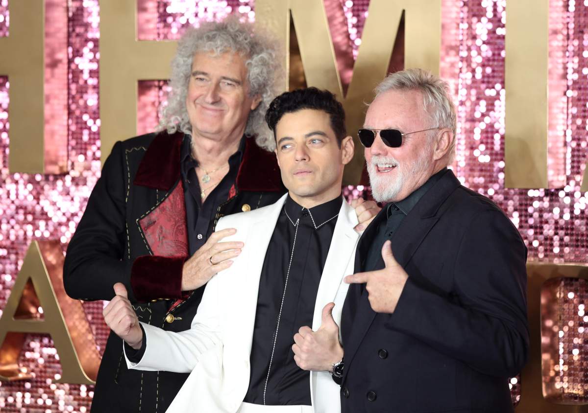 (L-R) Rami Malek, Brian May and Roger Taylor attend the world premiere of ‘Bohemian Rhapsody’ at The SSE Arena, Wembley on Oct. 23, 2018, in London, England.