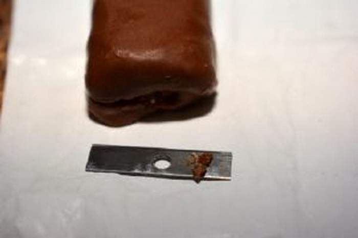 Toronto police issued a public safety alert after a man found a razor blade in his chocolate bar on Saturday.