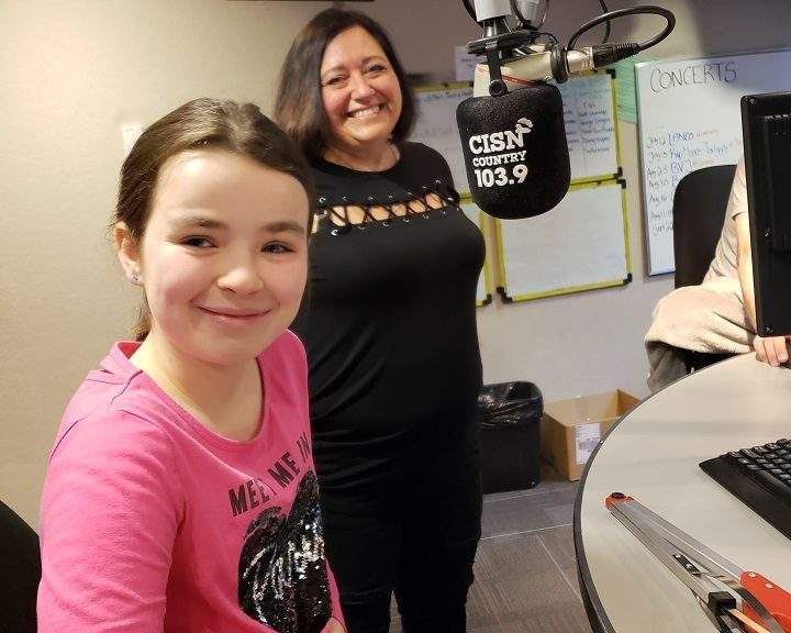 Flower girl Renee Morin and bride Bev Lesburg on CISN Country 103.9 on Oct. 2, 2018.