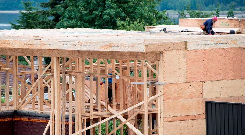 A new home is under construction in North Vancouver, B.C., Tuesday, June 12, 2018. The annual pace of Canadian housing starts in September slowed compared with August. THE CANADIAN PRESS Jonathan Hayward.