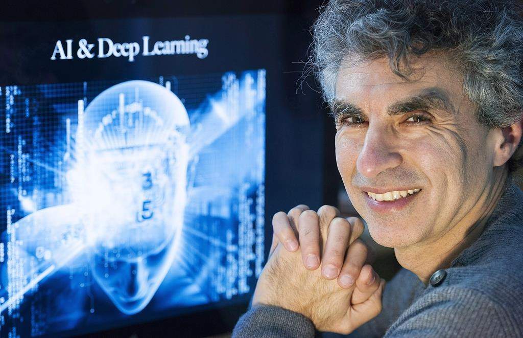 Computer Science professor Yoshua Bengio poses at his home in Montreal, Saturday, November 19, 2016. The Element AI co-founder will serve as a technical adviser for ServiceNow.