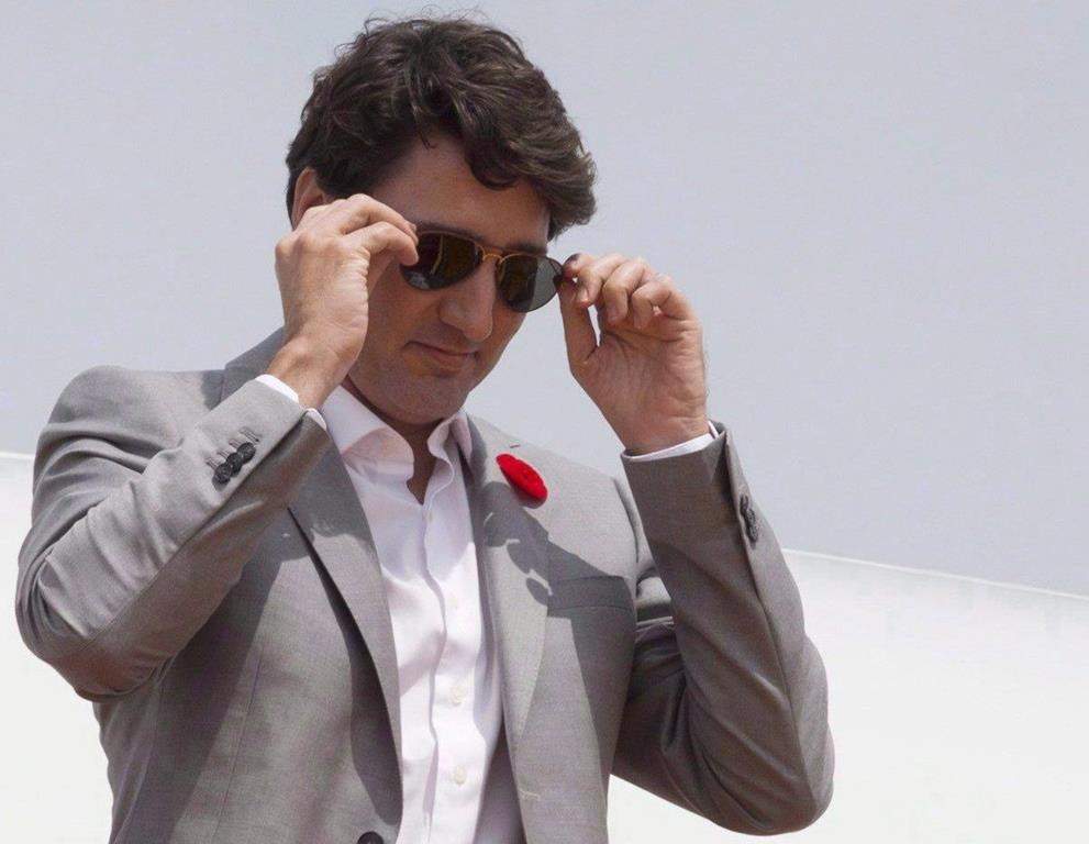 Canadian Prime Minister Justin Trudeau removes his sunglasses as he arrives in Ho Chi Minh City, Vietnam on Thursday November 9, 2017.