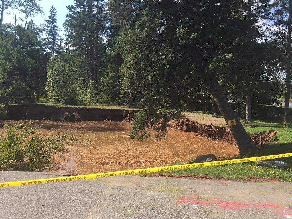 A sinkhole is seen in Oxford, N.S. on September 3, 2018. Emergency management officials say the area around a Nova Scotia town's sinkhole remains unsafe, three months after it first appeared in a local park.