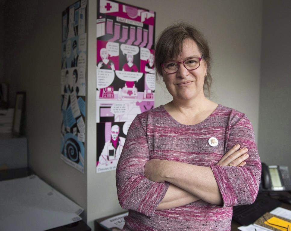 Gabrielle Bouchard, the new President of the Federation des femmes du Quebec (FFQ), is seen in her office, Tuesday, December 5, 2017 in Montreal. Quebec's most prominent women's group is being split by a debate over whether to acknowledge prostitution as a freely chosen career.