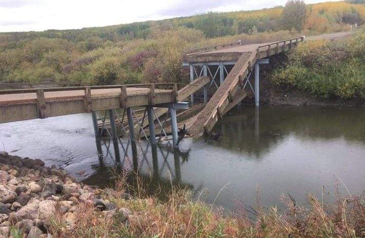 A collapsed bridge is seen in the Regional Municipality of Clayton in a Tuesday, Sept. 18, 2018, handout photo.