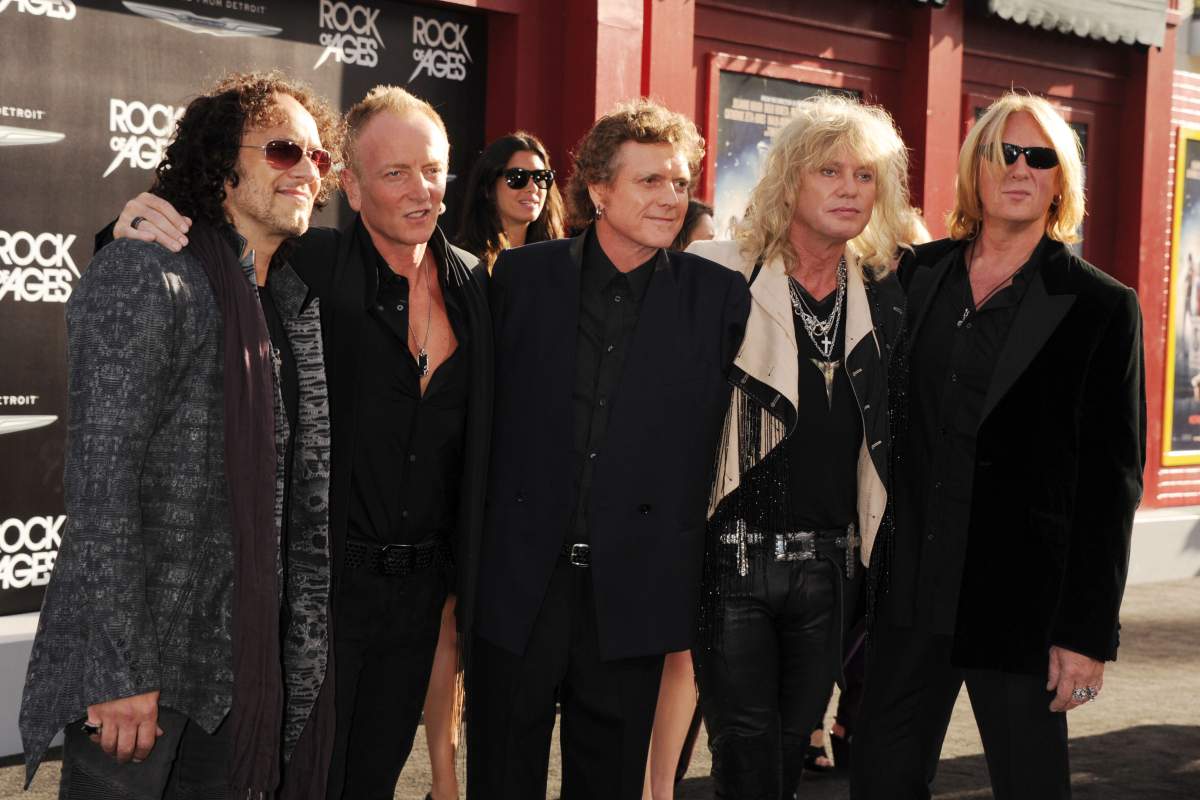 Def Leppard: (L-R) Vivian Campbell, Phil Collen, Rick Allen, Rick Savage and Joe Elliott at the Rock Of Ages L.A. Premiere on June 8, 2012, in Hollywood, Calif.