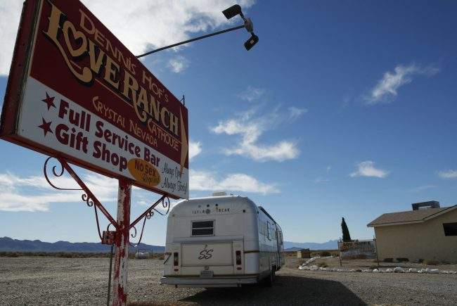 A sign advertises the Love Ranch brothel in Pahrump, Nev., Oct. 16, 2018.