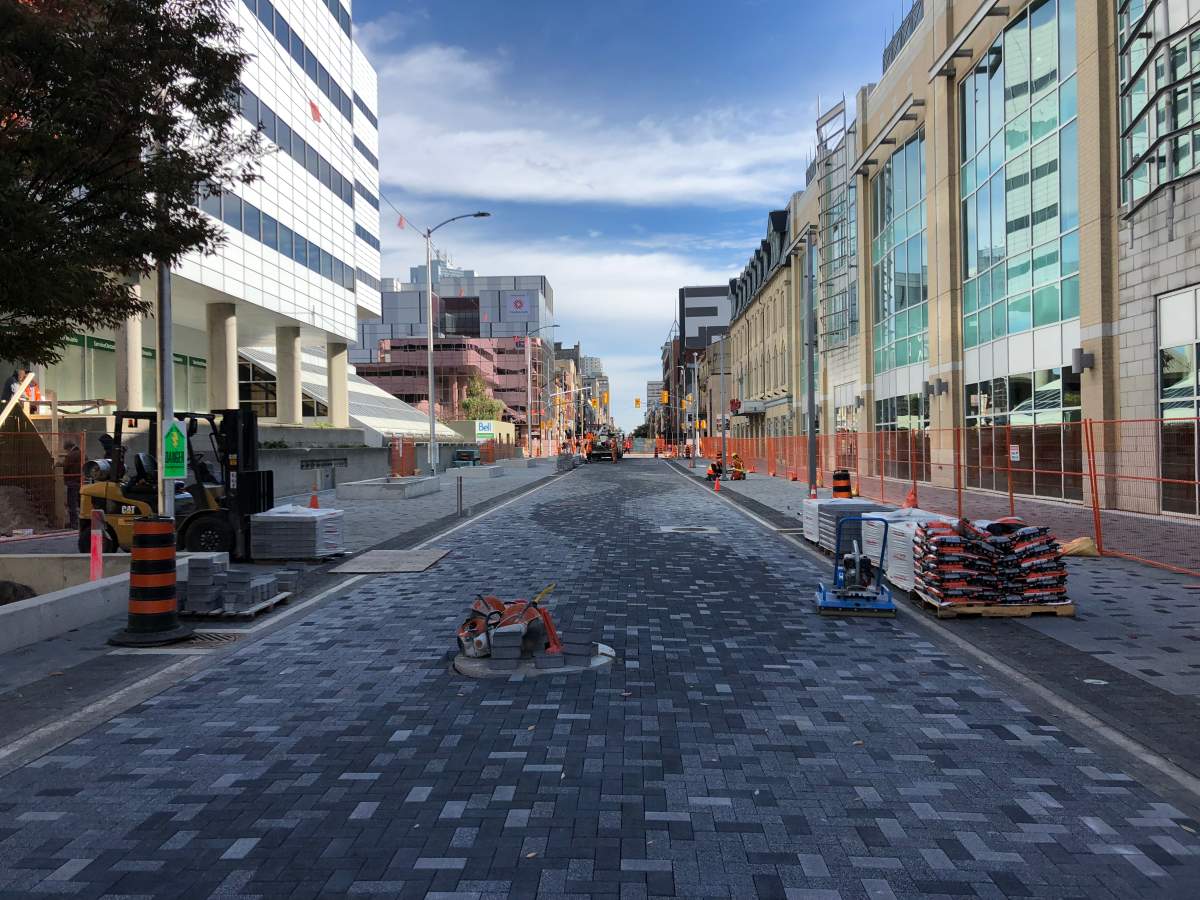 Dundas Place's freshly paved flex street heading eastbound towards Talbot Street. 