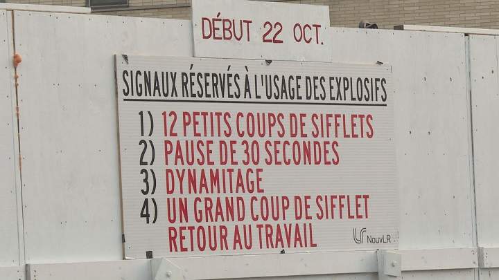 A sign warns of explosives use in the area. Twelve short beeps, followed by a 30 second pause will precede every blast. Monday, Oct. 22, 2018. 