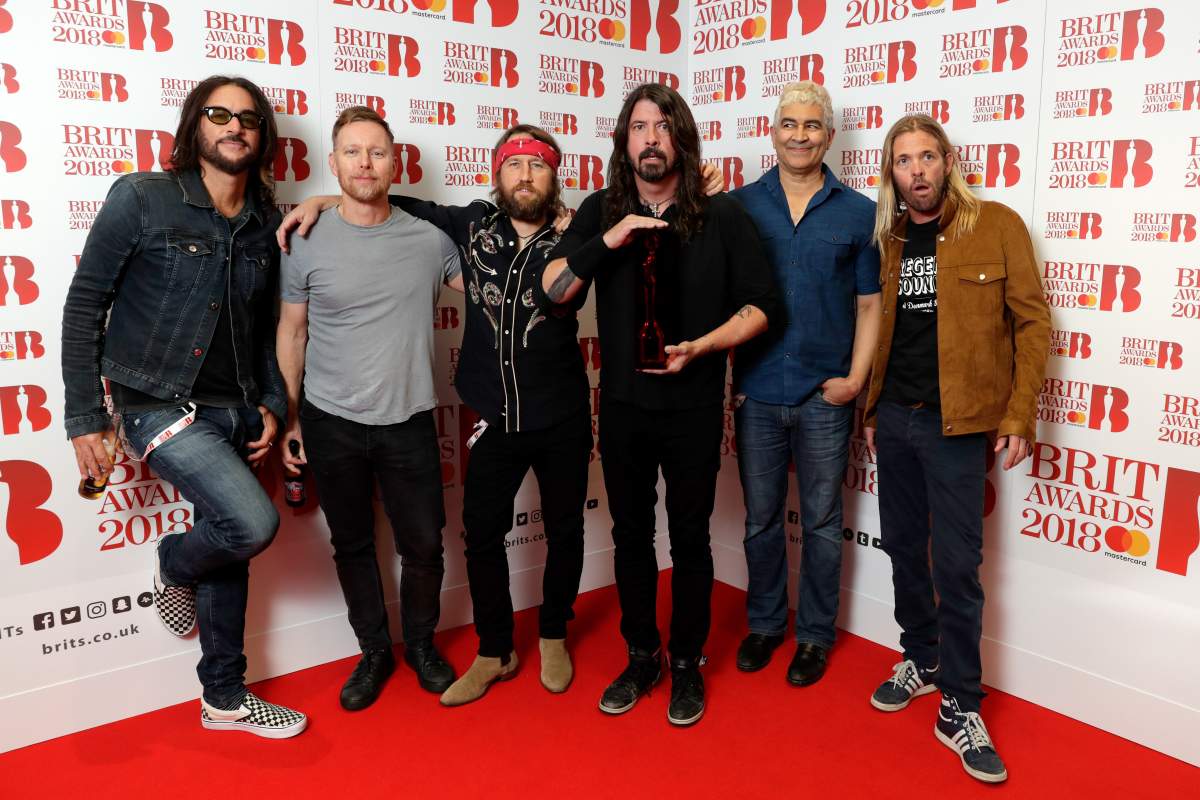 (L-R) Rami Jaffee, Nate Mendel, Chris Shiflett, Dave Grohl, Pat Smear and Taylor Hawkins of Foo Fighters, pose in the winners room during The BRIT Awards 2018 held at The O2 Arena on Feb. 21, 2018 in London, England.