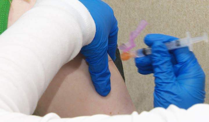 A person in the Calgary area with a lab-confirmed case of the flu has died.