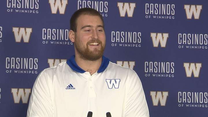 Former Manitoba Bisons offensive lineman Geoff Gray speaks with the media after signing with the Winnipeg Blue Bombers.