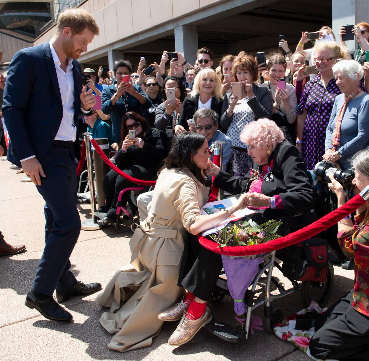 Prince Harry, Duke of Sussex and Meghan, Duchess of Sussex meet 98 year old Daphne Dunne during a meet and greet at the Sydney Opera House on October 16, 2018 in Sydney, Australia.