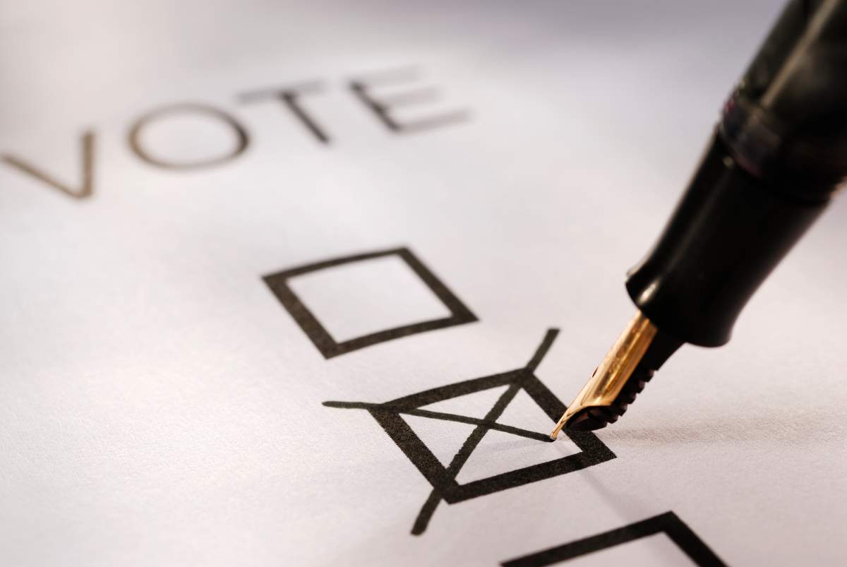 Voting slip putting a cross in a box.