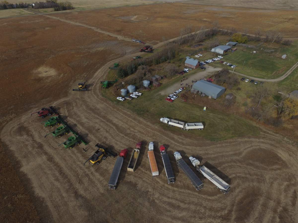 A group of Manitoba farmers gathered Oct 22. to take in a crop in support of farmers in developing countries. 