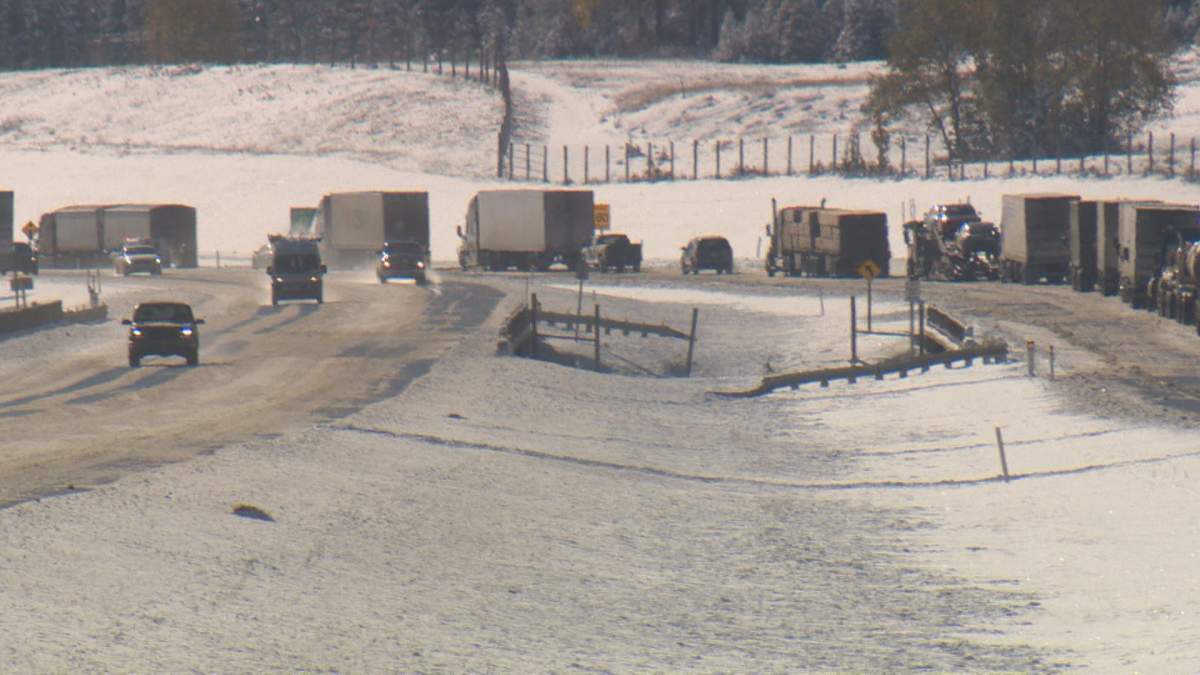 Highway 1 near Canmore, Alta., was re-opened after being closed for hours following a snowstorm on Oct. 2, 2018.