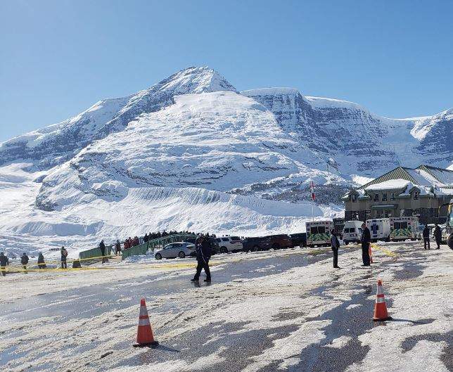 The scene of a collision where a woman was killed by her tour bus in the parking lot of the Columbia Icefield Discovery Centre on Thursday, Oct. 4.