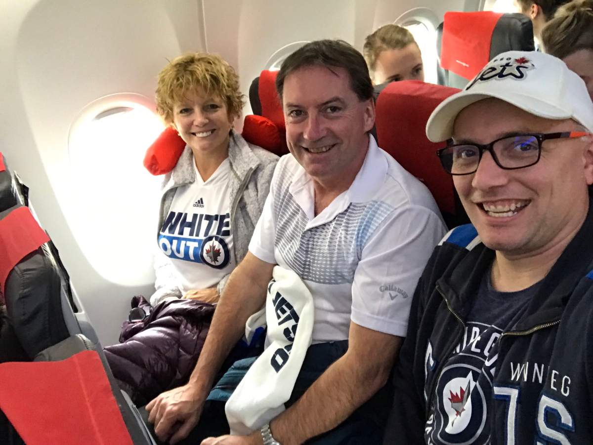 Laura Hawkins, her husband Allan and their son Shaun Gray on the plane to Helsinki.