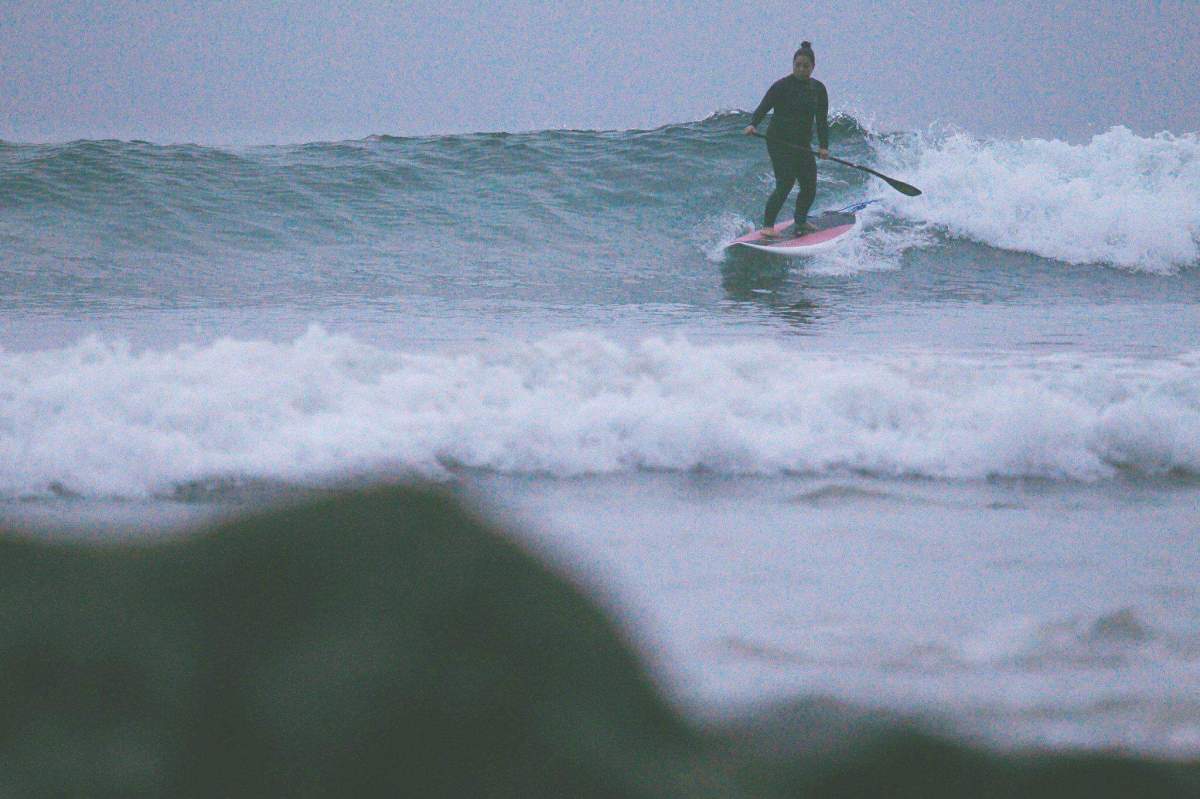 Robin Pacquing surfing.