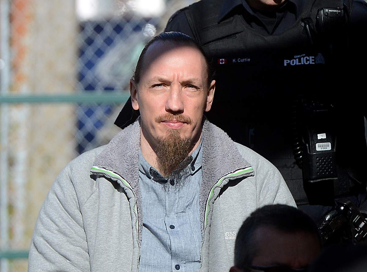 Stephan Dietrich is led into Ontario Superior Court of Justice in this 2017 file photo.