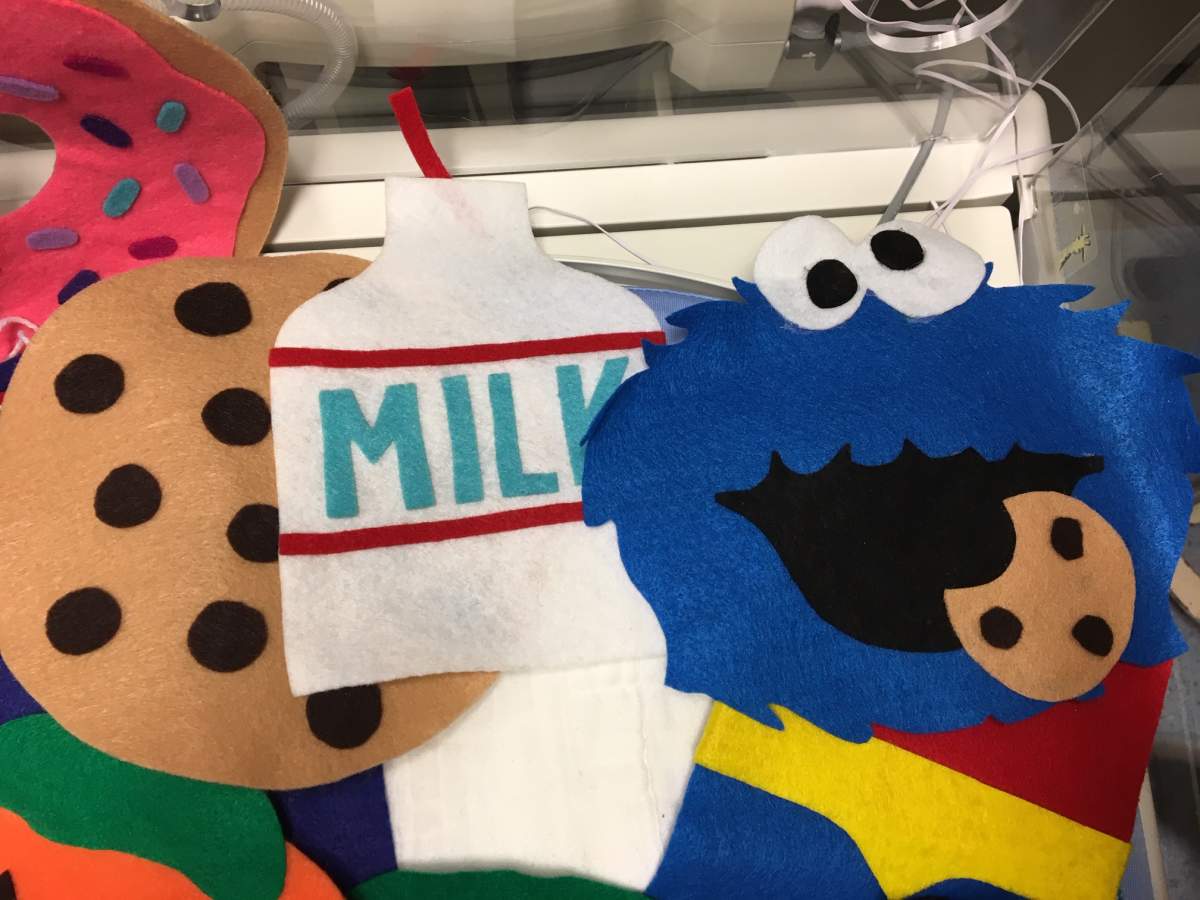 Homemade costumes for triplets in the Grey Nuns Community Hospital NICU.