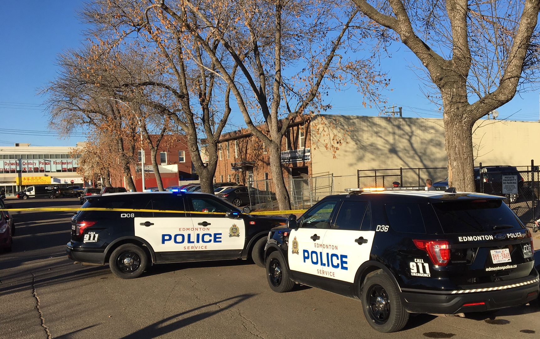 Police tape surrounding CarProof Auto Repair and Aftermath Autohaus Inc., located at 9648 105A Ave. near downtown Edmonton, where a man was critically injured  Tuesday morning. October 23, 2018.  
