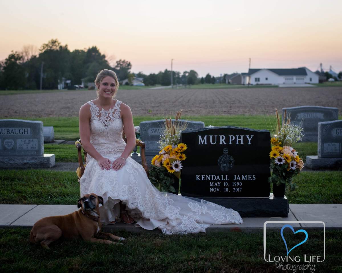 A bride takes her wedding day photos, 10 months after her fiance was killed in a car crash - image