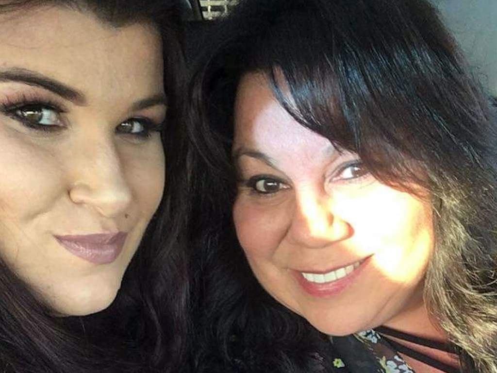 Lisa Manoy, right, helped saved a stranger's life in a grocery store. 