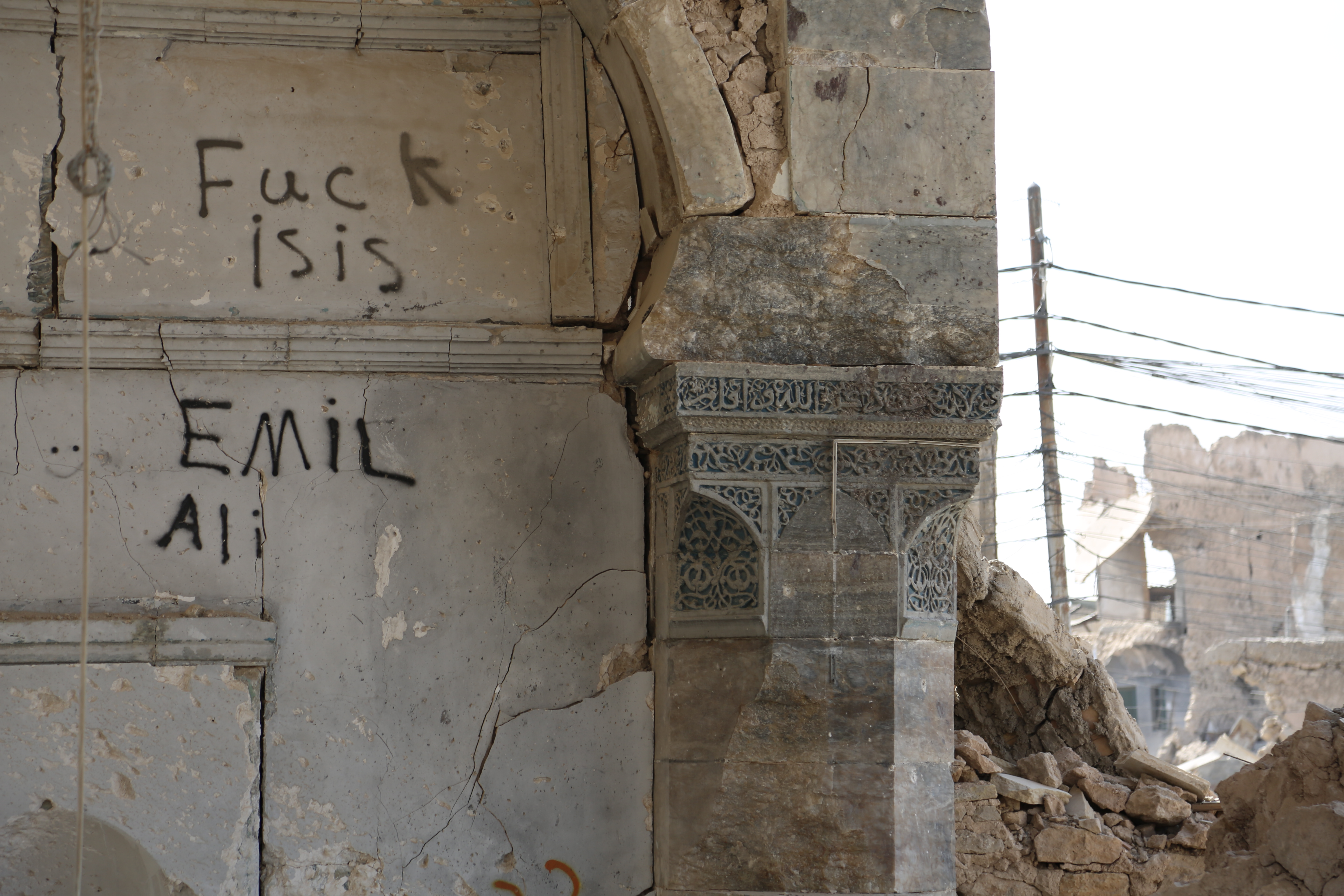 Graffiti near the location where ISIS leader Abu Bakr Al Baghdadi declared the creation of an Islamic State in June 2014. (Global News)