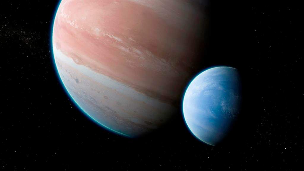 This illustration provided by Dan Durda shows the exoplanet Kepler-1625b with a hypothesized moon.