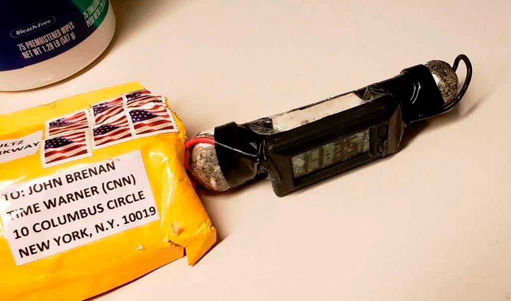 This image obtained Wednesday, Oct. 24, 2018, and provided by ABC News shows a package addressed to former CIA head John Brennan and an explosive device that was sent to CNN’s New York office.