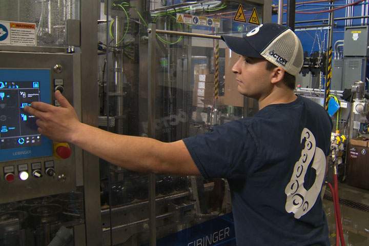A worker at Octopi Brewing in Waunakee, Wis. Jackson Proskow/Global News
