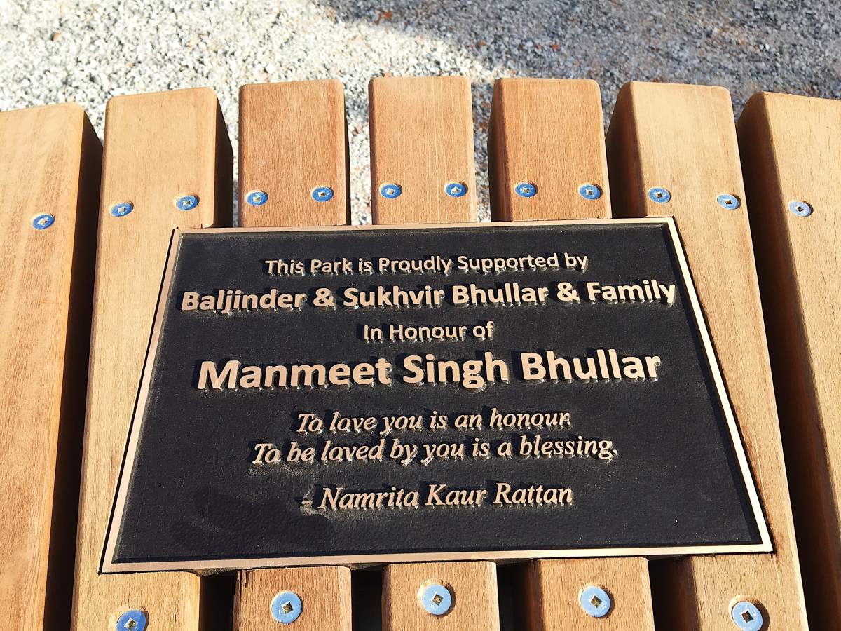 Plaque on bench at Manmeet Singh Bhullar Park