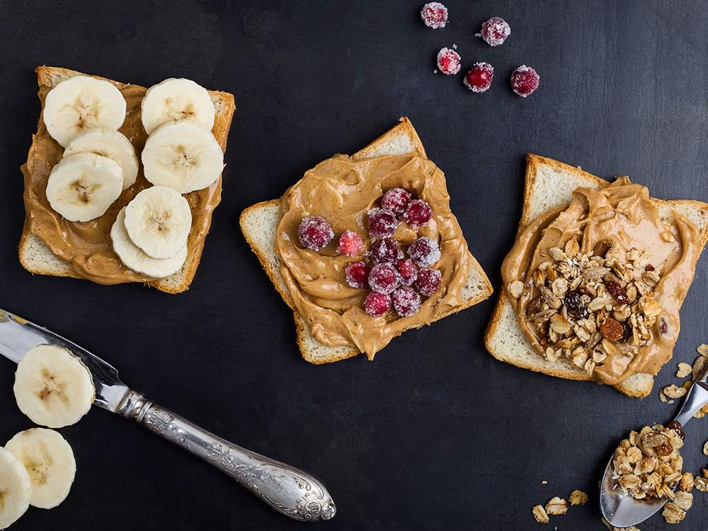 Experts say it's best to eat peanut butter with another food, like an apple, to avoid overeating it. 
