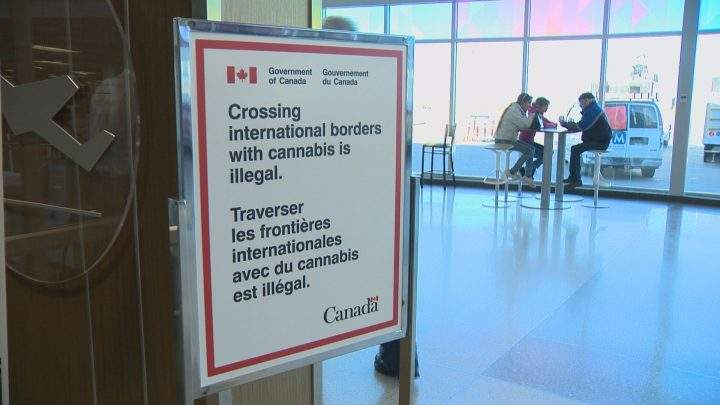 This sign is displayed in front of the airport security check-in at the Saskatoon airport.