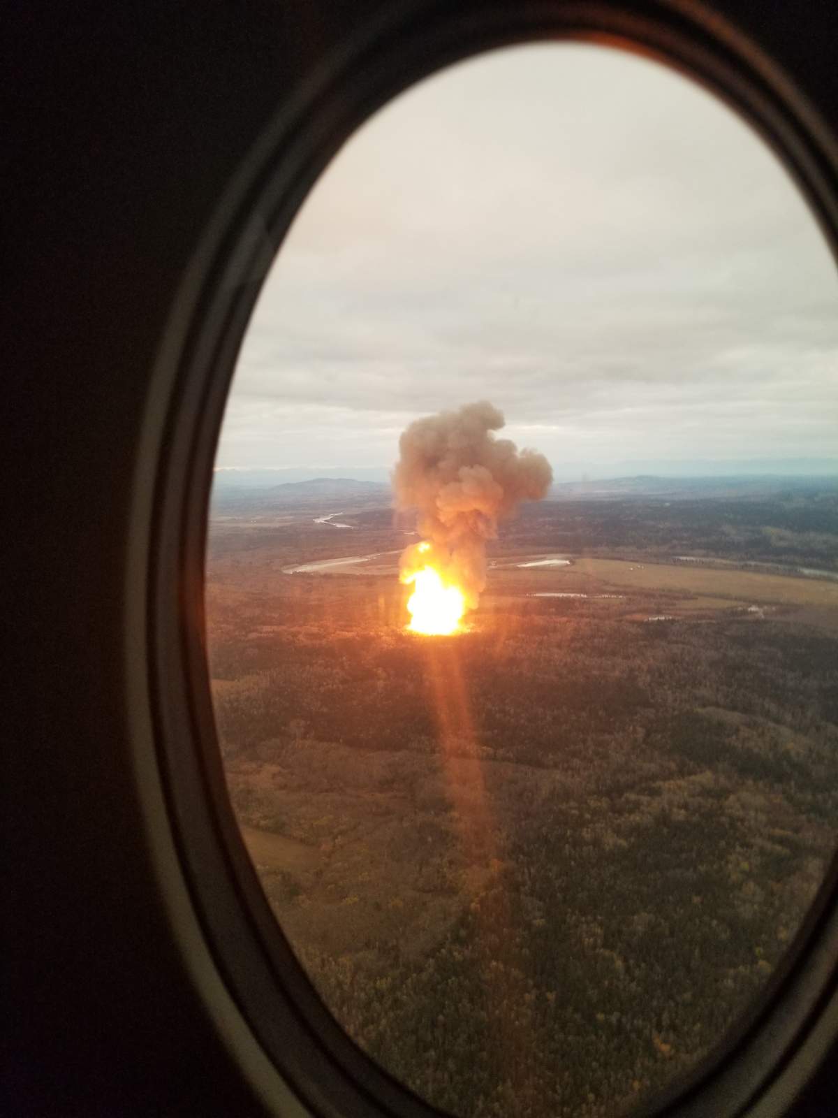 Troy Samkow snapped this photo of the pipeline explosion near Prince George when he was on a charter flight Tuesday evening.